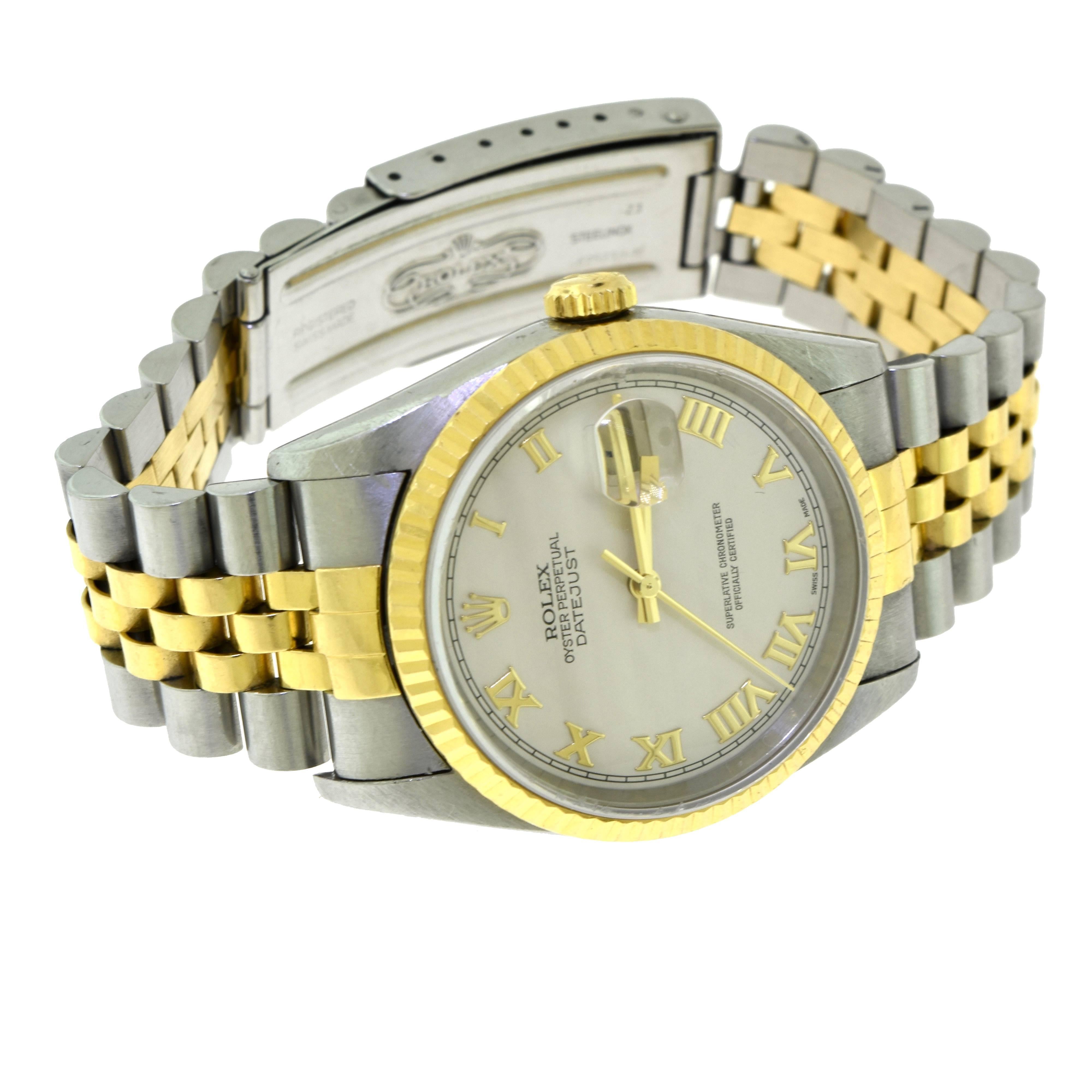 This is a beautiful Rolex Model Datejust Steel Yellow Gold Ivory Pyramid Dial Mens Watch with Model Number 16233.
Movement: officially certified chronometer automatic self-winding movement. Calibre is 3135 and has 31 jewels. The case size is 36 mm