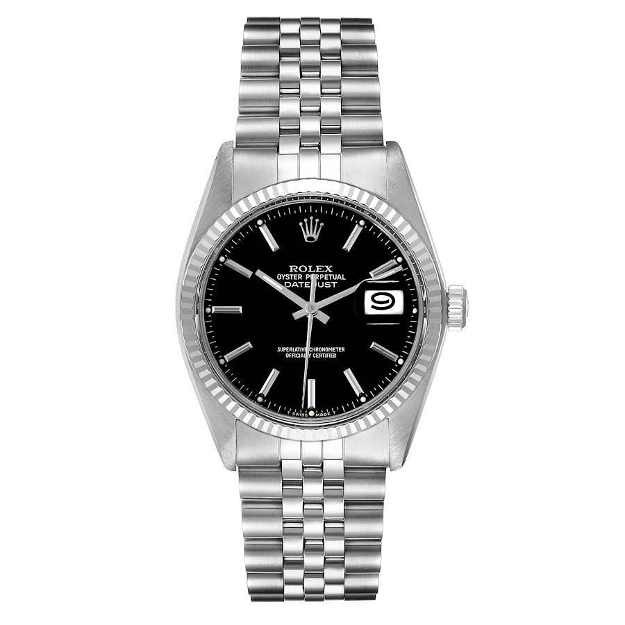 Rolex Datejust Vintage Steel White Gold Black Dial Mens Watch 16014. Officially certified chronometer self-winding movement. Stainless steel oyster case 36 mm in diameter. Rolex logo on a crown. 18k white gold fluted bezel. Acrylic crystal with