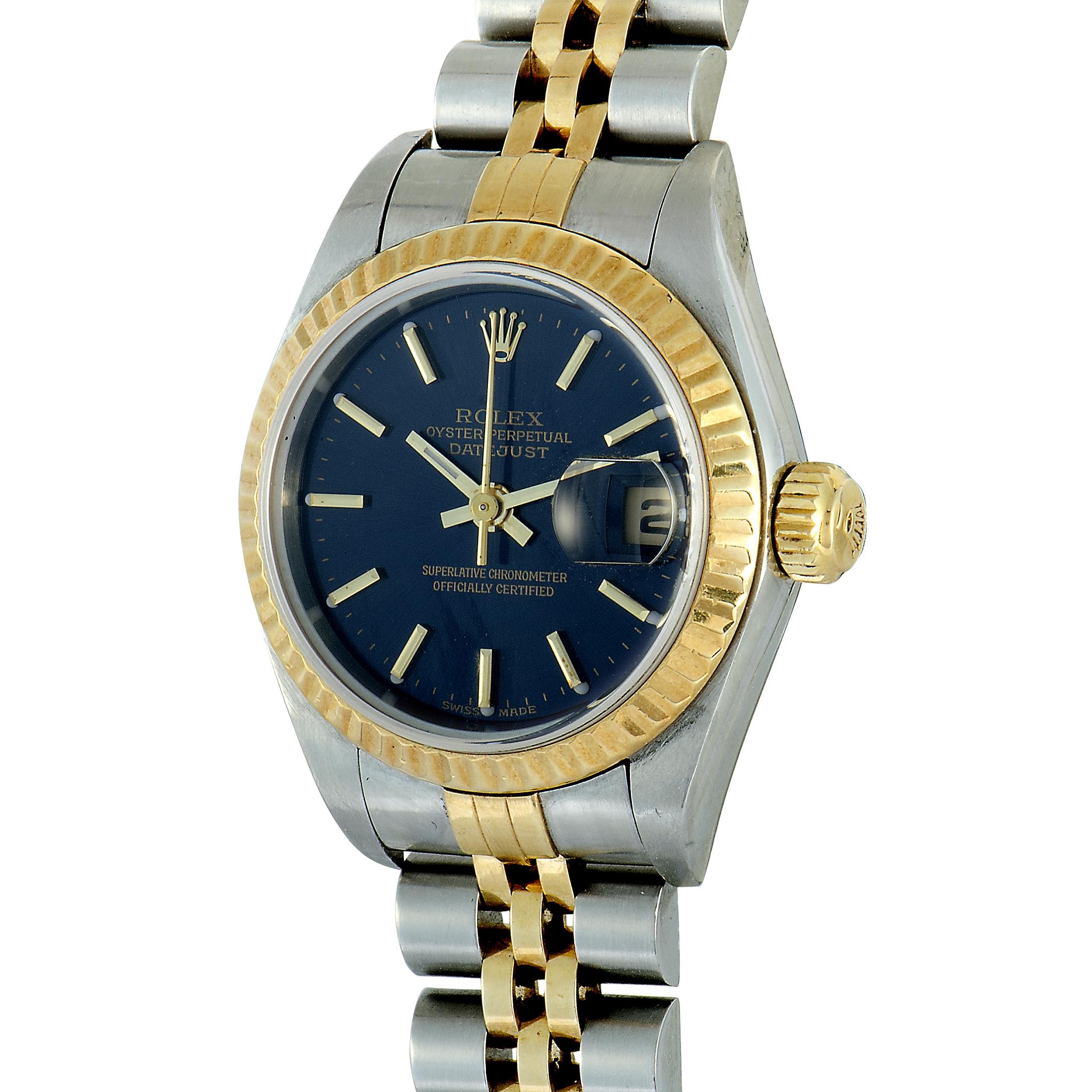 This is the Rolex Datejust, reference number 16233.

The watch boasts a 26 mm stainless steel case that is fitted with an 18K yellow gold fluted bezel. Powered by a self-winding movement, this model features the following functions on the blue dial: