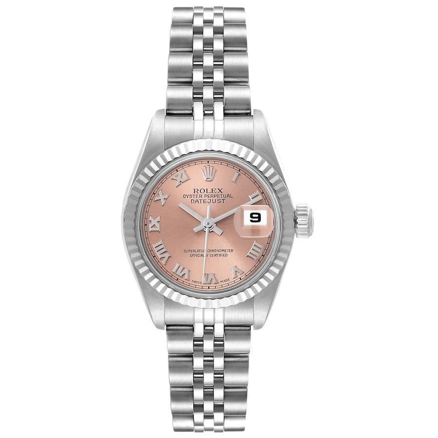 Rolex Datejust White Gold Salmon Dial Steel Ladies Watch 79174. Officially certified chronometer automatic self-winding movement. Stainless steel oyster case 26.0 mm in diameter. Rolex logo on the crown. 18K white gold fluted bezel. Scratch