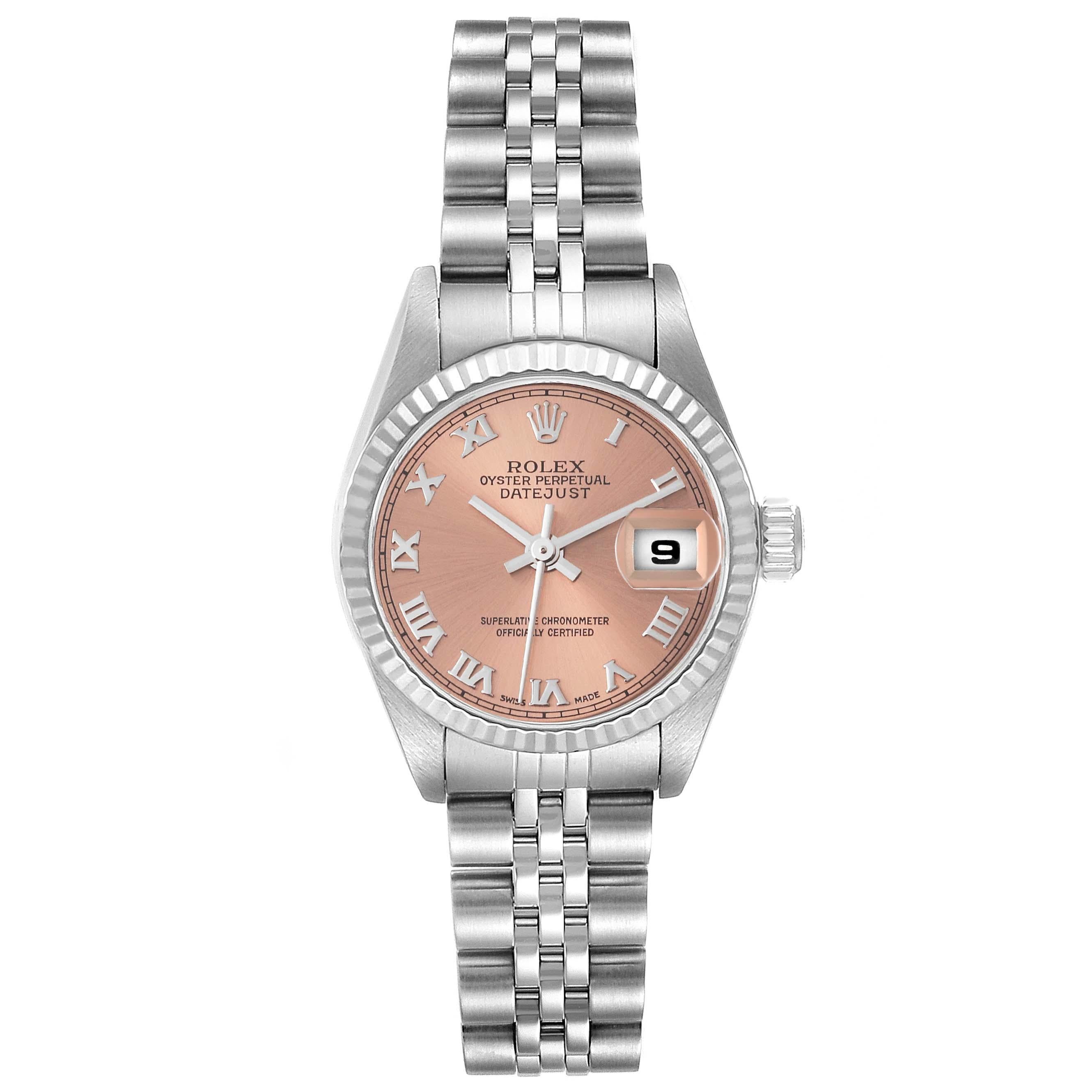 Rolex Datejust White Gold Salmon Dial Steel Ladies Watch 79174. Officially certified chronometer automatic self-winding movement. Stainless steel oyster case 26.0 mm in diameter. Rolex logo on the crown. 18K white gold fluted bezel. Scratch