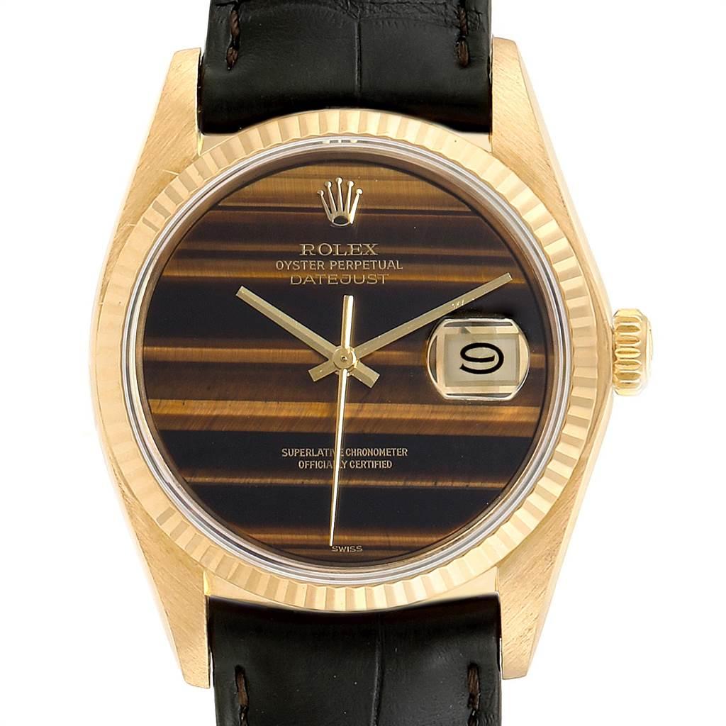 Rolex Datejust Yellow Gold Tiger Eye Dial Vintage Mens Watch 16018. Officially certified chronometer self-winding movement. 18k yellow gold case 34.0 mm in diameter. Rolex logo on a crown. 18k yellow gold fluted bezel. Acrylic crystal with cyclops