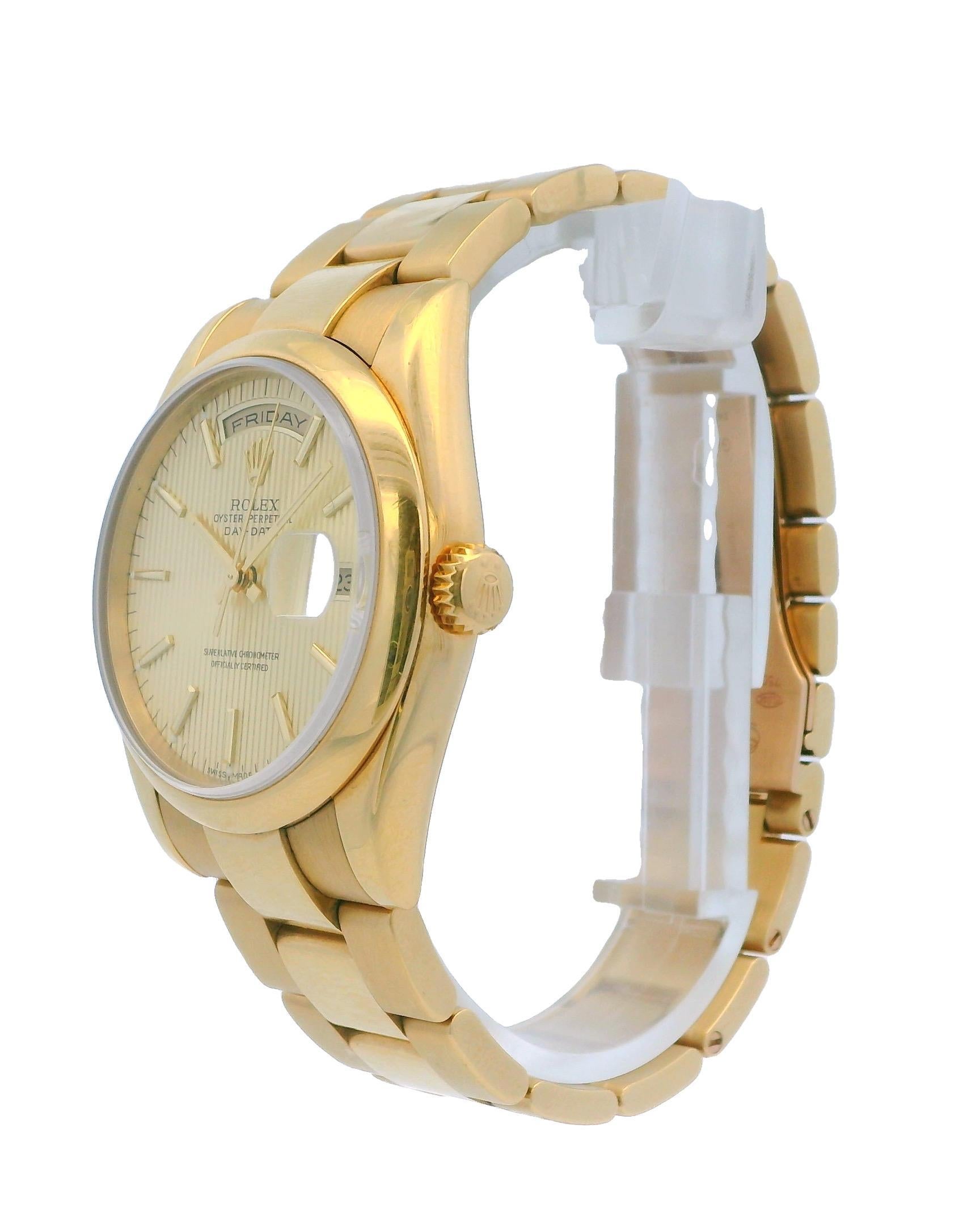 Rolex Day-Date 118208 Watch. This timepiece features a 36mm case made of 18K yellow gold, complemented by a smoothed 18K yellow gold bezel. The dial is a champagne linen color, equipped with gold hands and index hour markers, along with minute