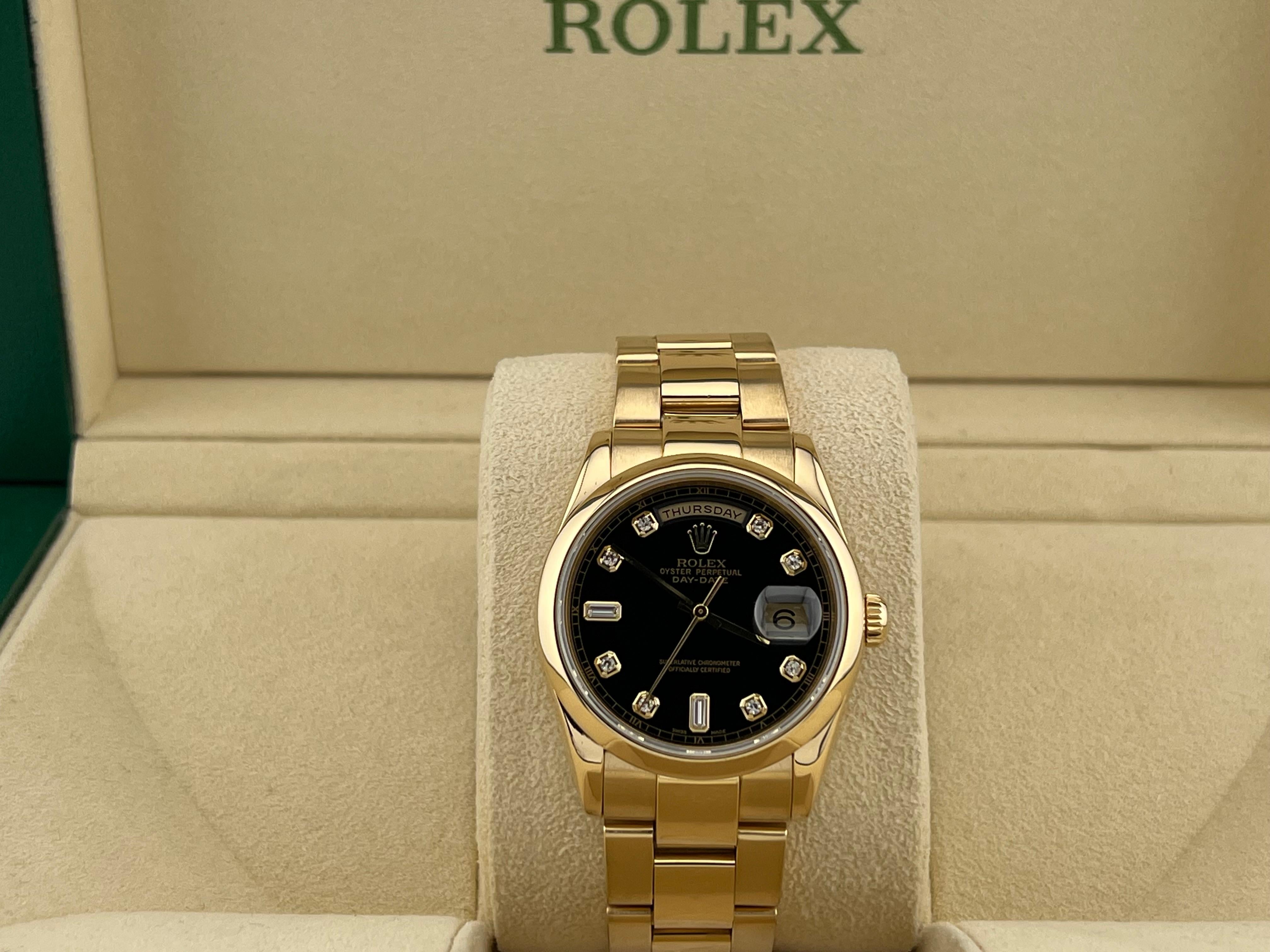 Style Number: 118208



Serial: K770***



Year: 2001

 

Model: Rolex Day Date 

 

Case Material: 18K Yellow Gold 

 

Band: 18K Yellow Gold 

  

Bezel: 18K Yellow Gold  

  

Dial: Original Black Diamond Dial 

 

Face: Sapphire Crystal 

