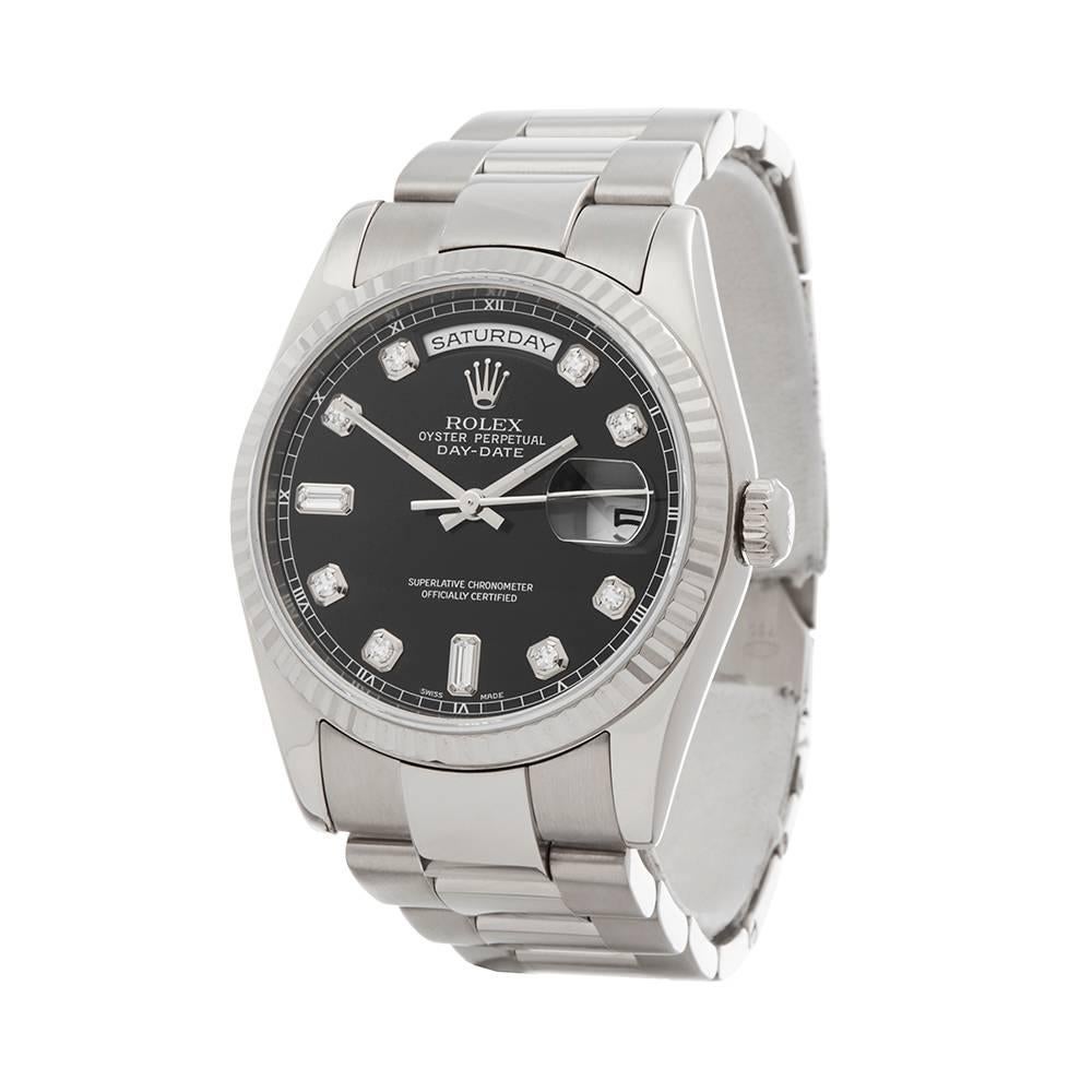 Ref: W4995
Manufacturer: Rolex
Model: Day-Date
Model Ref: 118239
Age: 
Gender: Mens
Complete With: Box Only
Dial: Black & Diamond Markers
Glass: Sapphire Crystal
Movement: Automatic
Water Resistance: To Manufacturers Specifications
Case: 18k White
