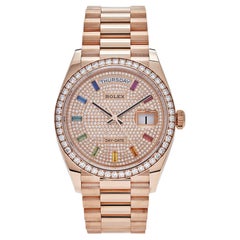 Rolex Montre Day-Date 128345RBR en or rose avec cadran pavé de diamants arc-en-ciel (2021)