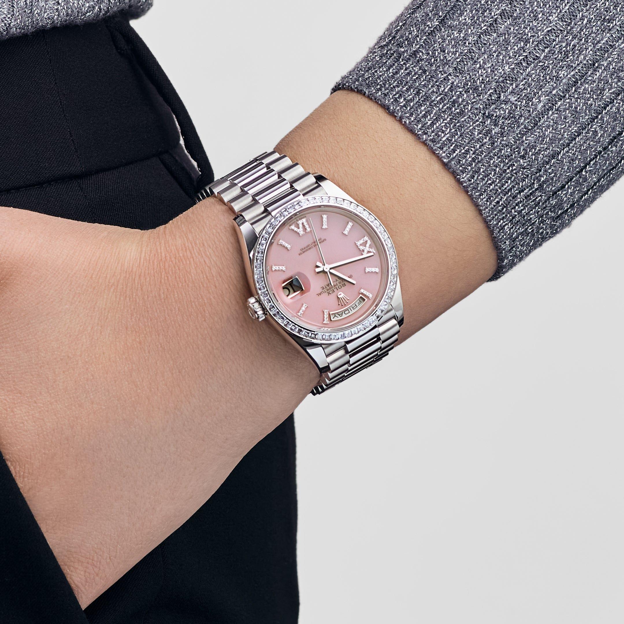 Jewels Aficionado offers the Rolex Day-Date 128396TBR is a stunning display of artistry and craftsmanship, rendered in luxurious platinum and accented by brilliant diamonds. Its 36mm case exudes a refined elegance, with the bezel meticulously set