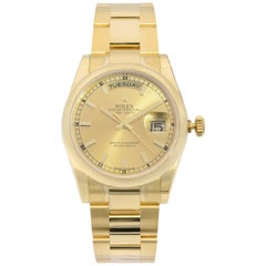 Rolex Day-Date 18 Karat Yellow Gold Champagne Dial Automatic Men’s Watch 118208