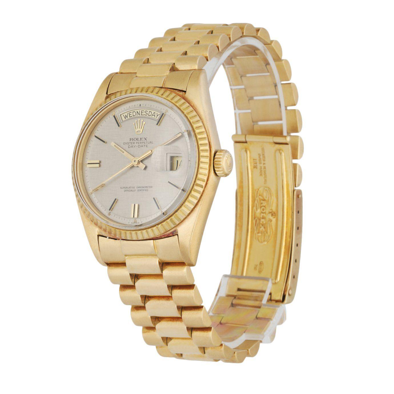 Rolex Day-Date 1803 men's watch. 36mm 18k Yellow gold case with 18K yellow gold fluted bezel.Â Silver linen dial with gold luminous hands andÂ index hour markers. Minute markers on the outer dial. Date display at the 3 o'clock position and day