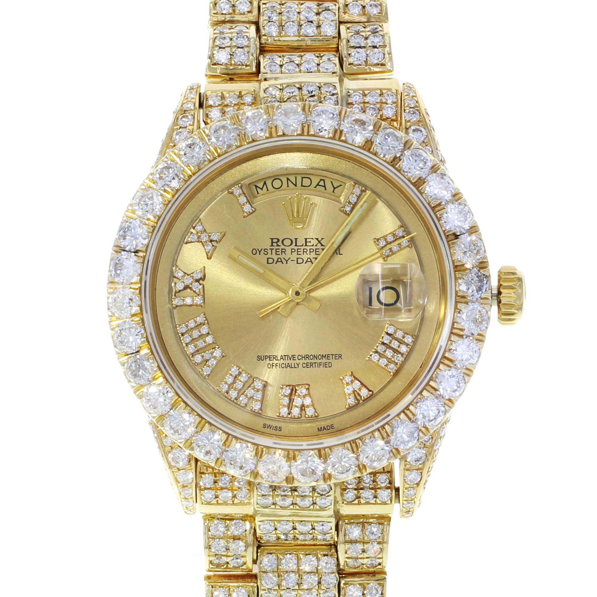 Rolex Day Date 1803 Yellow Gold Champagne Dial Custom Diamond 16ct Mens Watch

This pre-owned Rolex Day Date 1803  is a beautiful men's timepiece that is powered by an automatic movement which is cased in a yellow gold case. It has a round shape