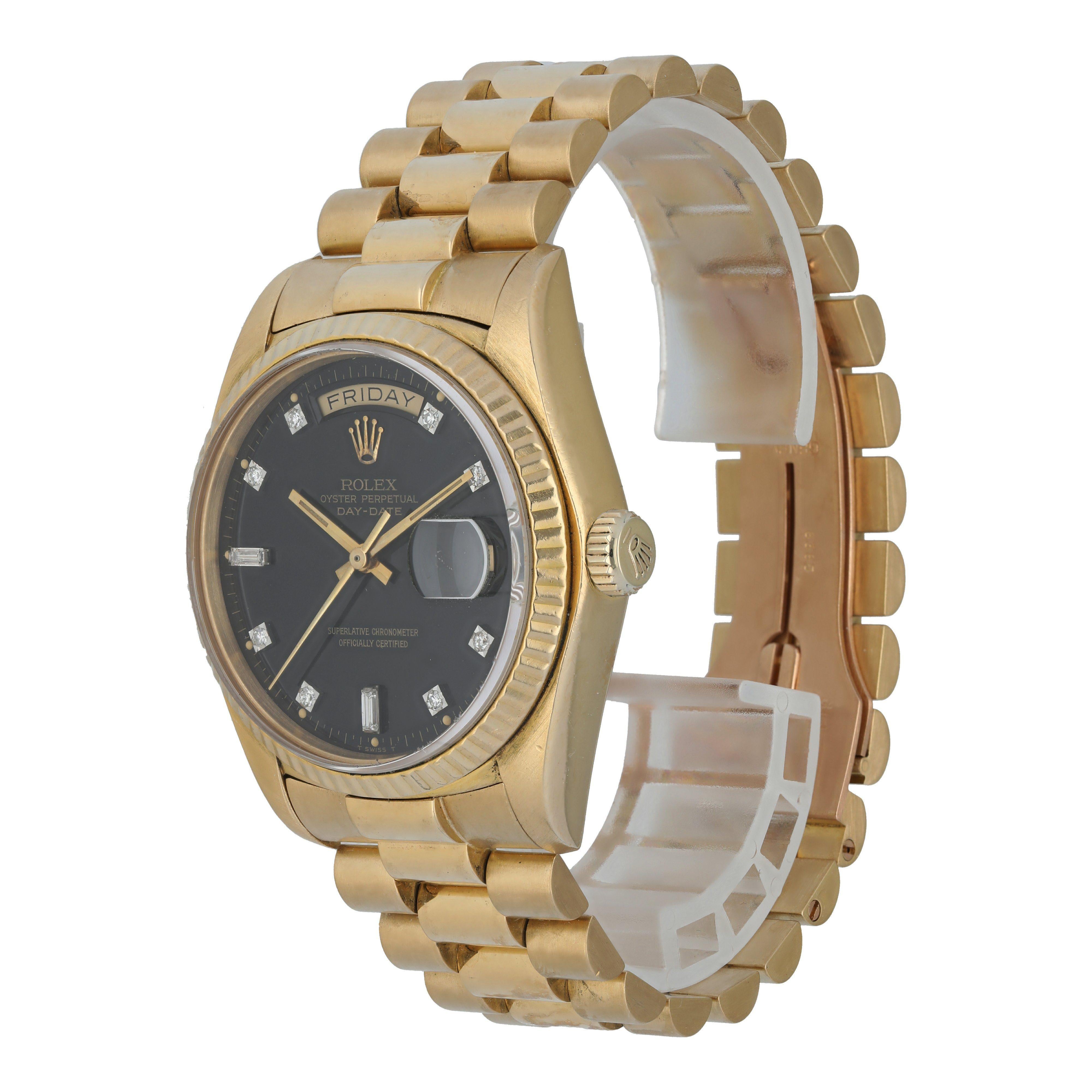Rolex Day-Date 18038 Diamond Dial Men's Watch.
36mm yellow gold case with a stationary fluted bezel.
Black dial with gold hands and factory set diamond hour markers. Gold oyster bracelet with a fold-over clasp.
Will fit up to a 7-inch wrist.