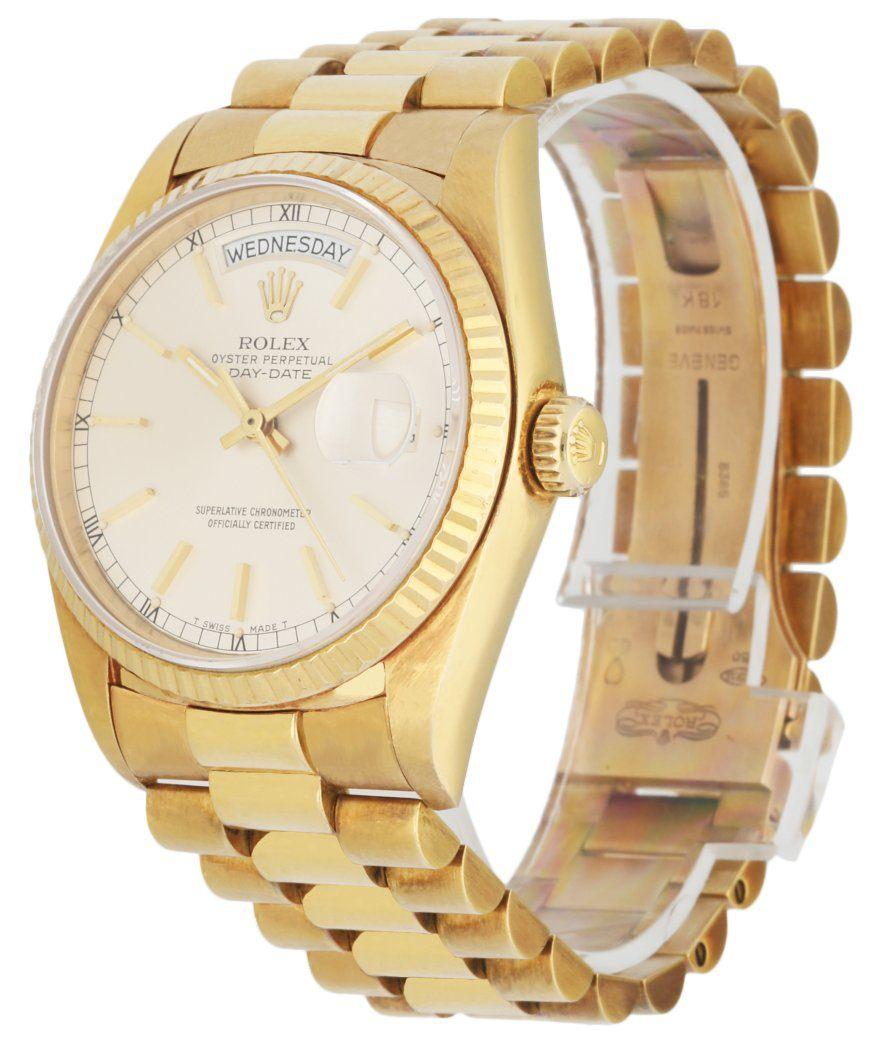 Rolex Day-Date President 18038 Men's Watch. 36MM 18k Yellow gold case with fluted bezel. Silver dial with gold hands and index hour markers. Date display at the 3 o'clock position. Day display at the 12 o'clock position. 18K Yellow Gold President