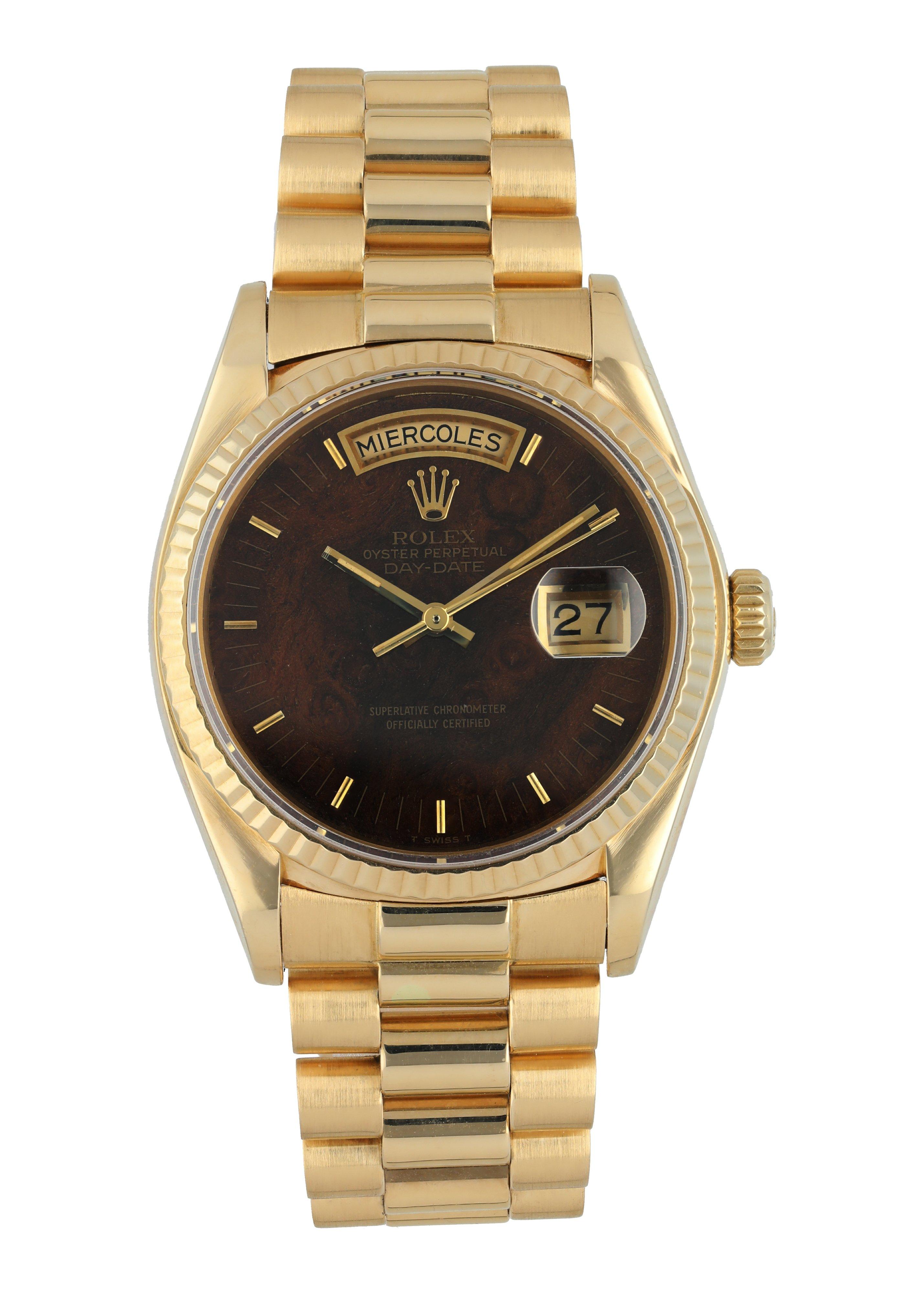 Rolex Day-Date 18038 President Men's Watch. 
36mm 18k Yellow gold case. 
18k Yellow Gold fluted Stationary bezel. 
Wood dial with gold hands and index hour markers. 
Minute markers on the outer dial. 
Date display at the 3 o'clock position. 
Yellow