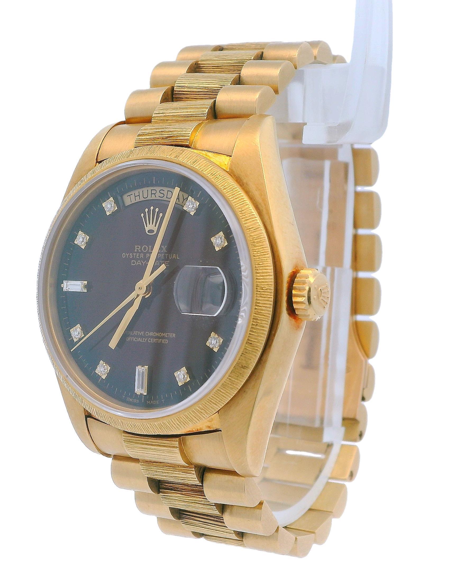 Rolex Day-Date 18038 Men's Watch. This timepiece features a 36mm case made of 18K yellow gold, complemented by an 18K yellow gold fluted bezel. The dial showcases a striking red degrade finish, with gold hands and factory-set diamond hour markers. A