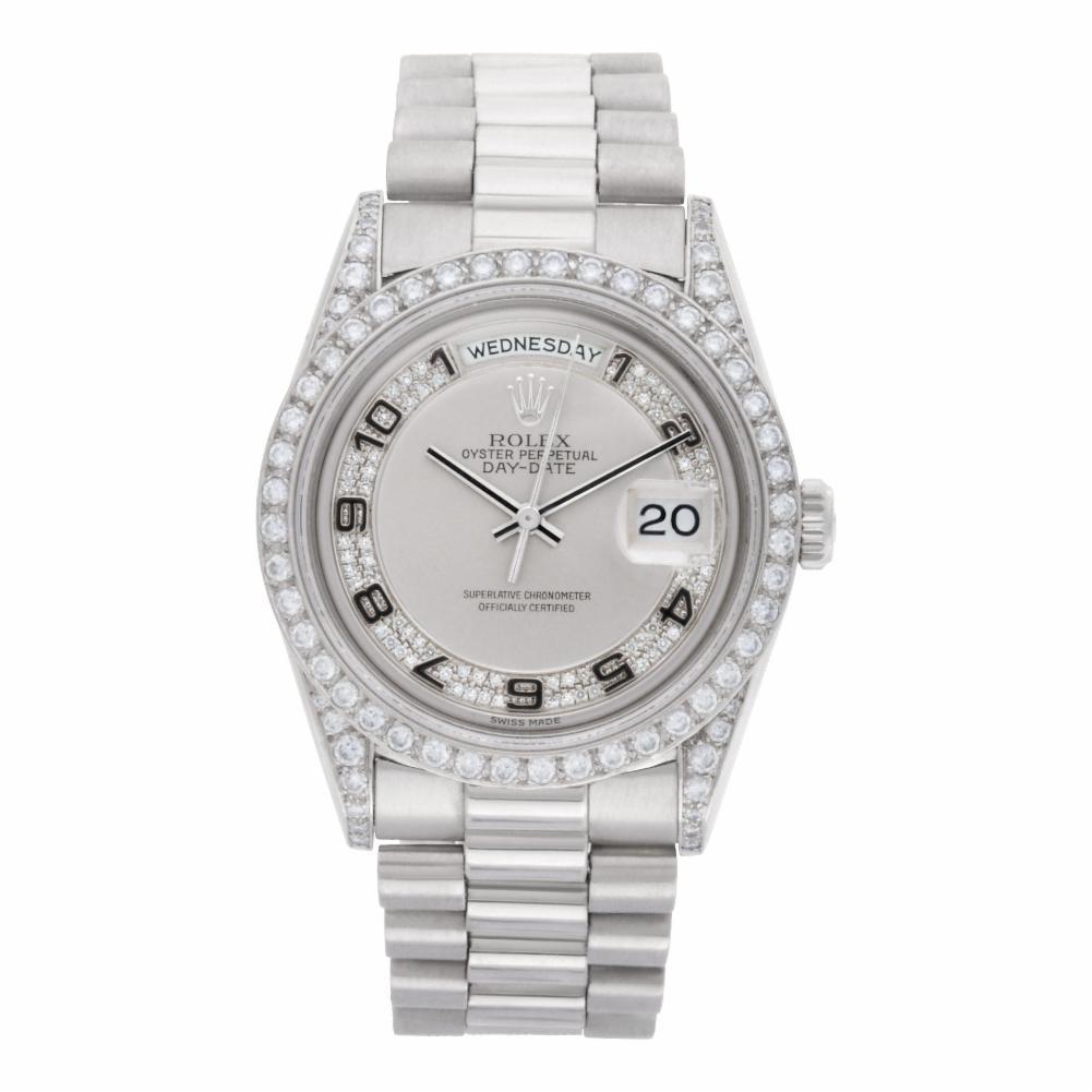 Rolex Day-Date Reference #:18206. Rolex Day -Date President in platinum with genuine diamond lugs & genuine rhodium Myriad diamond dial with luxury custom diamond bezel. Auto w/ sweep seconds, date and day. Ref 18206. Circa 1993. Complete with Rolex