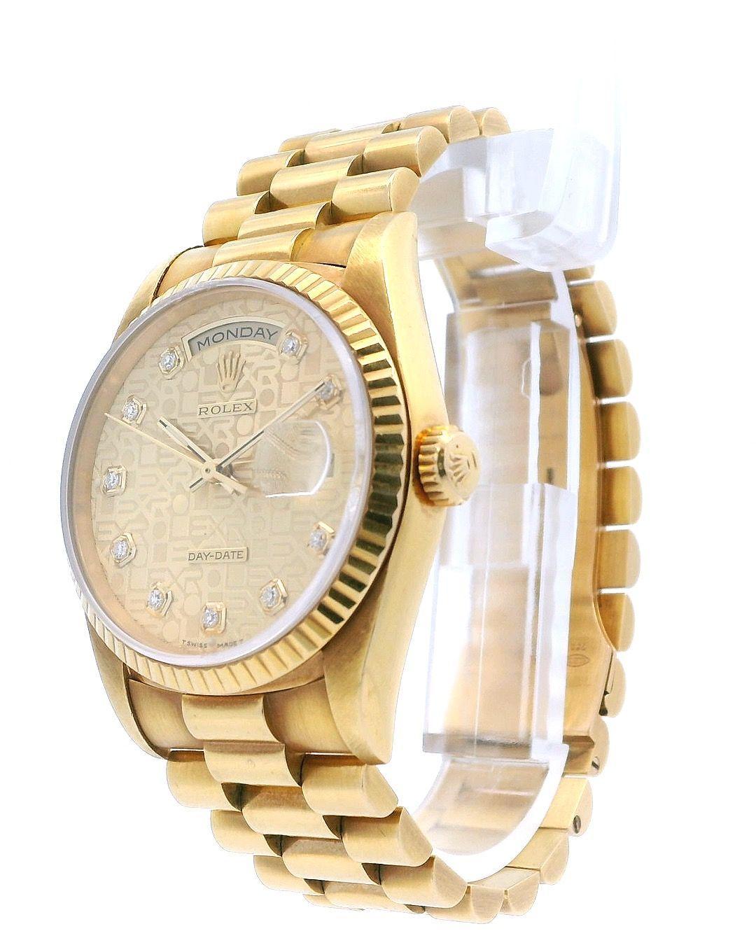 Rolex Oyster Perpetual Day-Date President 18238 Watch. 36mm 18k yellow gold case and 18k yellow gold fluted bezel. Champagne Anniversary dial with gold hands and diamond hour marker. Day display at 12 o'clock. Date display at 3 o'clock. 18k yellow