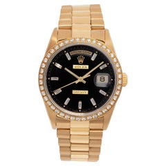 Montre Rolex Day-Date 18238 en or jaune avec cadran noir 36 mm Automatique