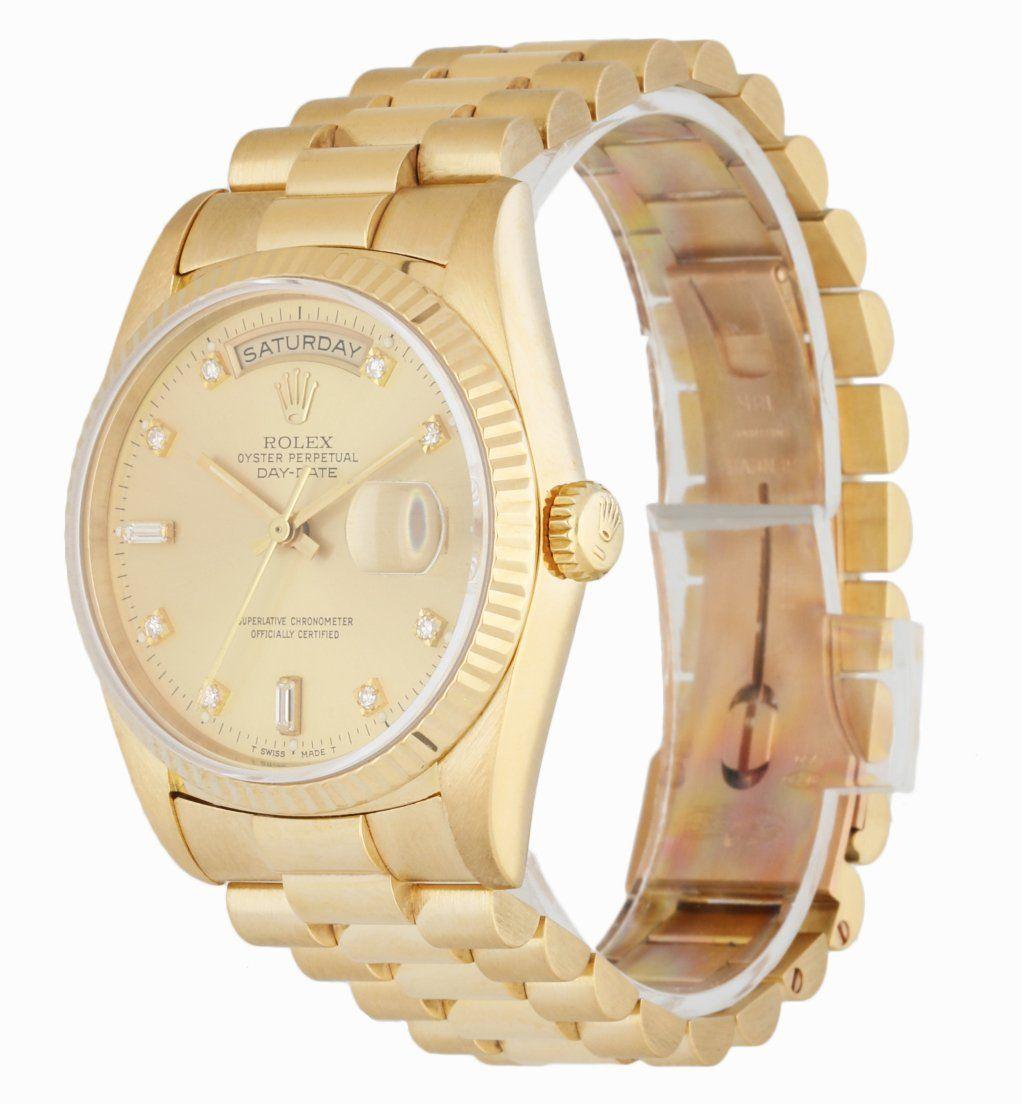 Rolex Day Date 18238 men's watch. 36MM 18K yellow gold case with 18K yellow gold fluted bezel. Champagne dial with gold hands and factory diamonds hour marker. Date display at 3 o'clock position & day display at 12 o'clock position. 18K yellow gold
