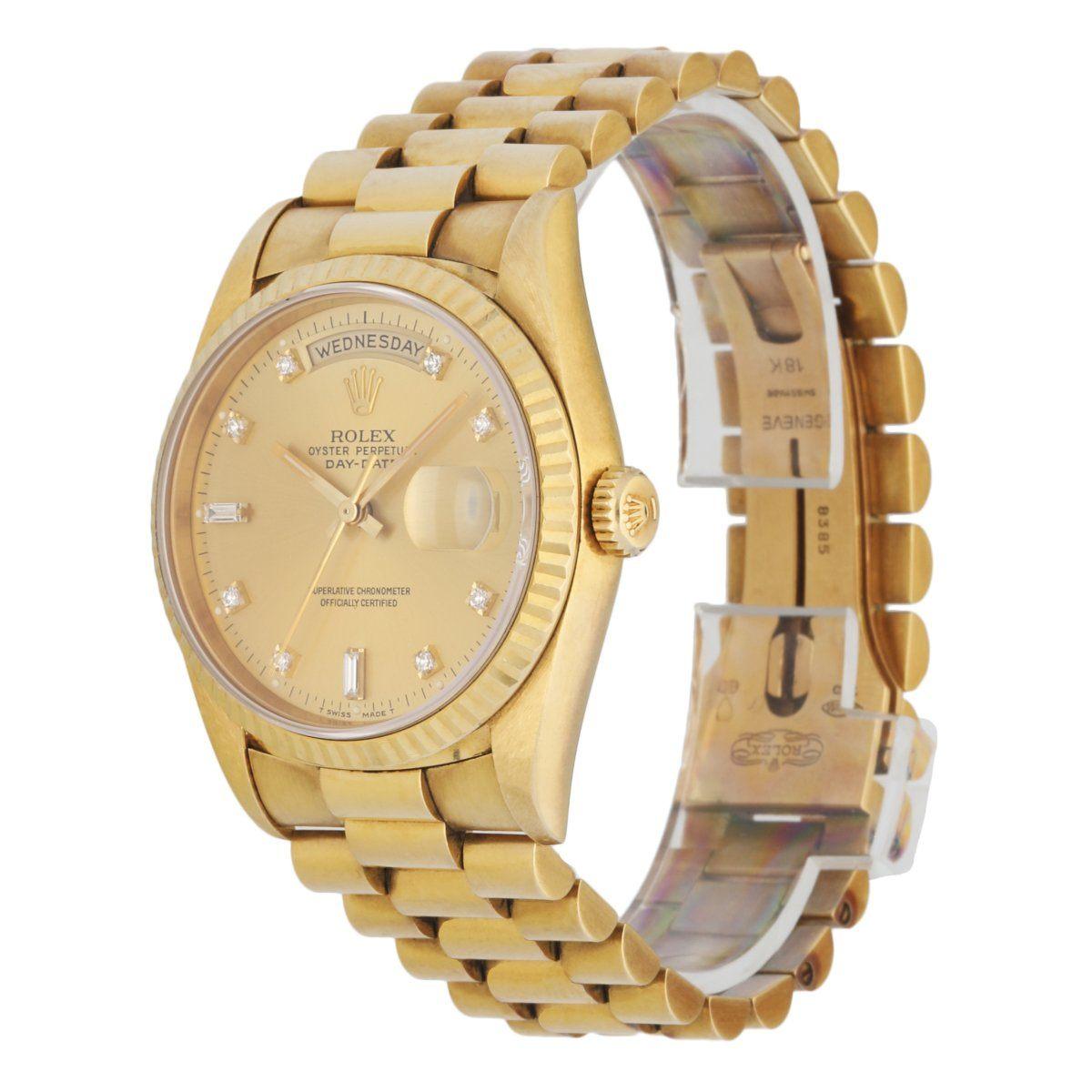 Rolex Day Date 18238 men's watch. 36MM 18K yellow gold case with 18K yellow gold fluted bezel. Champagne dial with gold hands and factory diamonds hour marker. Date display at 3 o'clock position & day display at 12 o'clock position. 18K yellow gold