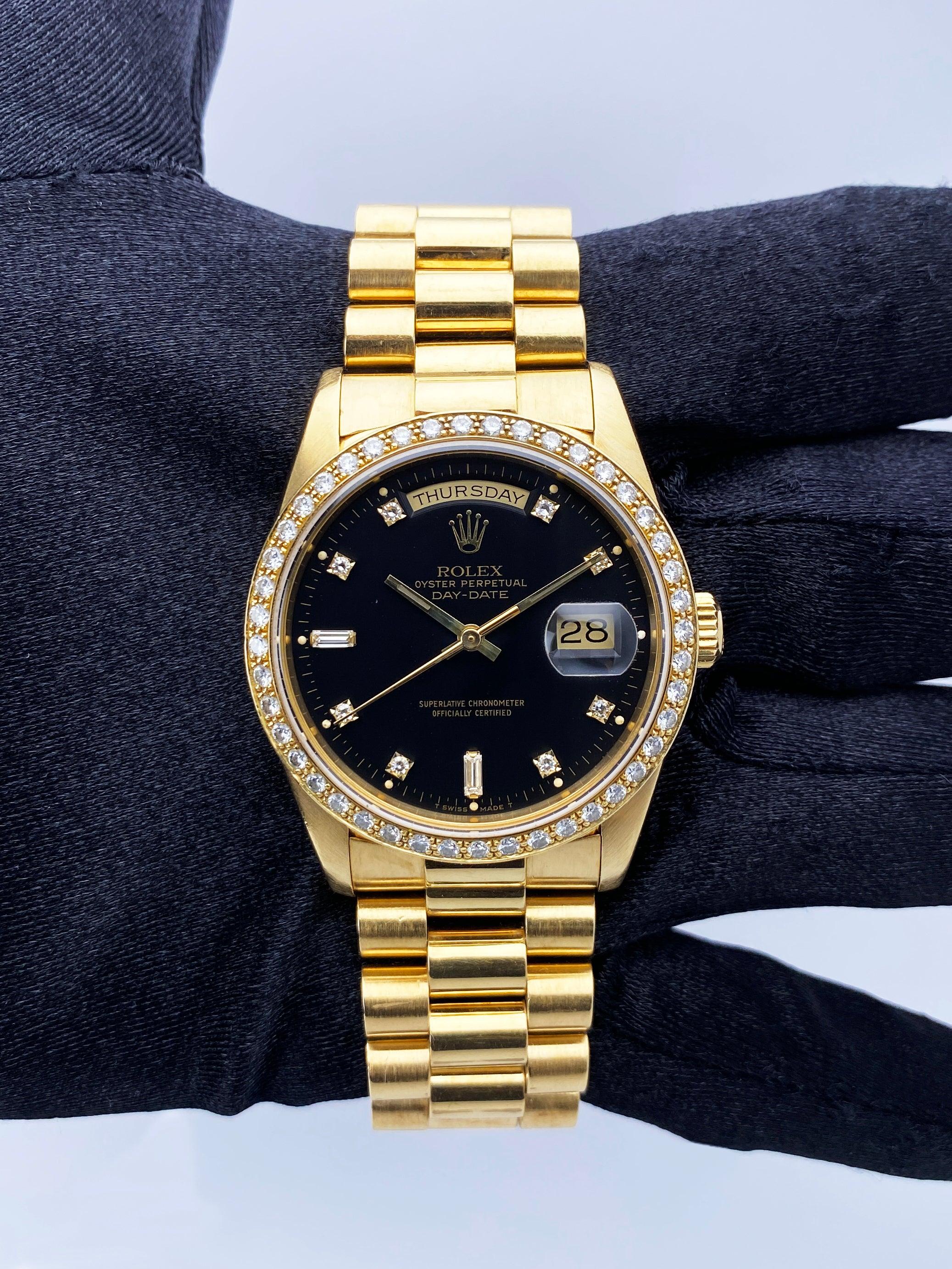 Rolex Oyster Perpetual Day Date 18348 Mens Watch. 36mm 18K yellow gold case. 18K yellow gold bezel with original factory diamond set insert. Black dial with luminous gold hands and original factory diamond set hour marker. Date display at 3 o'clock