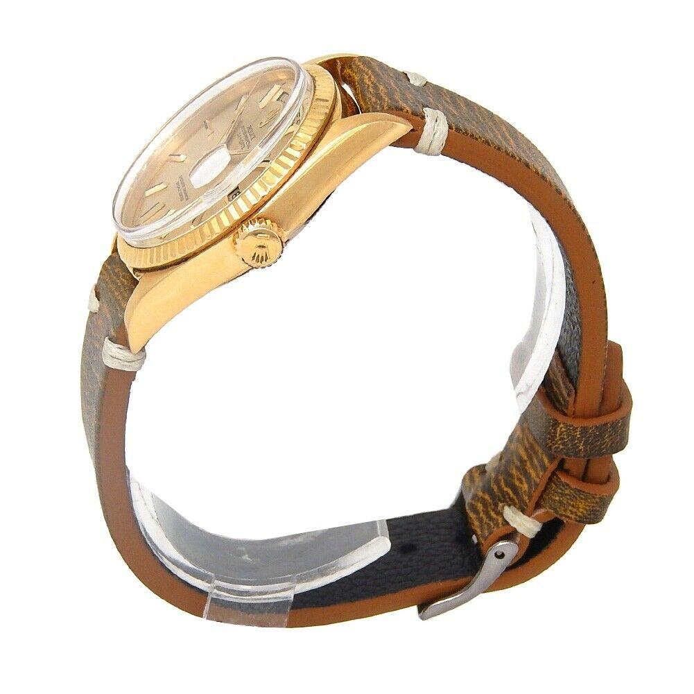 Brand: Rolex
Band Color: Brown	
Gender:	Men's
Case Size: 36mm	
MPN: Does Not Apply
Lug Width: 20mm	
Features:	12-Hour Dial, Gold Bezel, Swiss Made, Swiss Movement
Style: Luxury	
Movement: Mechanical (Automatic)
Age Group: Adult	
Water Resistance