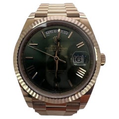 Reloj Rolex Day-Date 228235 Pulsera President rosa con bisel rosa Esfera aceituna