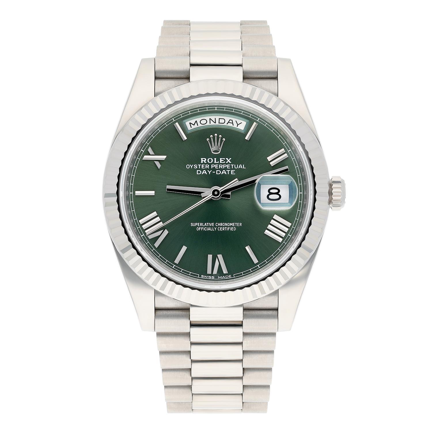 This is the Rolex Day-Date 40mm Anniversary model in solid 18ct white gold. The rare commemmorative olive-green Roman numeral dial was introduced to mark the 60th Anniversary of the Day-Date in 2016, and is the most sought-after of all the dial