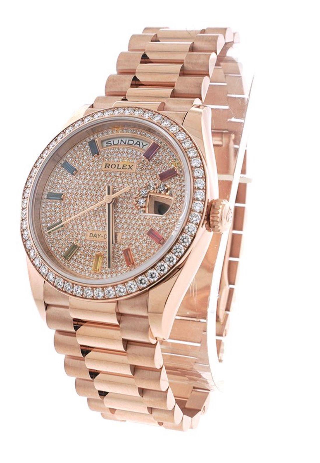 Rare Rolex presidential.
This beautiful watch is made of rose gold, the bezel is encrusted with 52 white diamonds on the President’s bracelet , showcasing a completely new, unique dial with diamond pave and 10 baguette-style sapphires of all rainbow