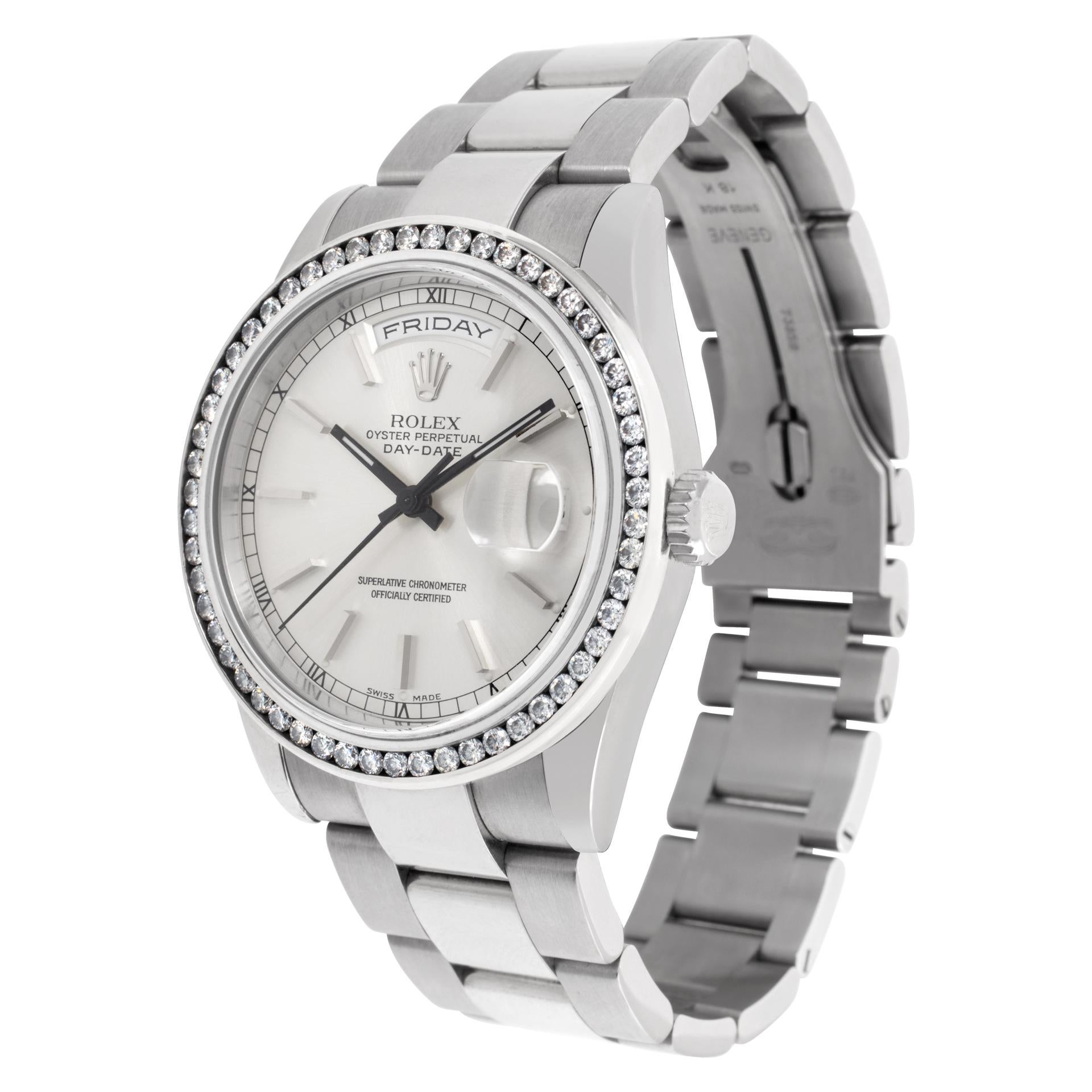 Rolex Day-Date in 18k white gold with Oyster bracelet and custom channel set diamond bezel. Auto w/ sweep seconds day and date. 36 mm case size. With original papers. Circa 2002. Ref 118209. **Bank wire only at this price** Fine Pre-owned Rolex