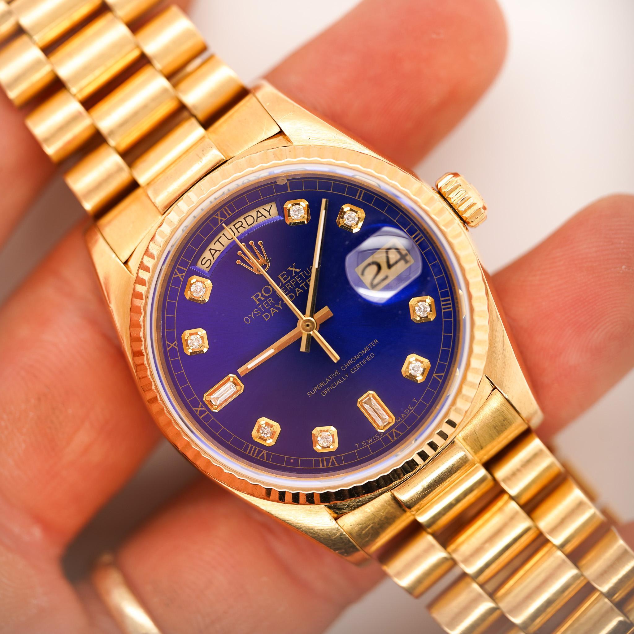 Rolex Day-Date 36mm watch deep night blue dial and aftermarket diamond hour markers, set in solid 18K yellow gold. Ref 18038 with Presidential bracelet and fluted fixed bezel. Fits up to an 8.5-inch wrist. Vintage, year 1987. Single quick-set (date