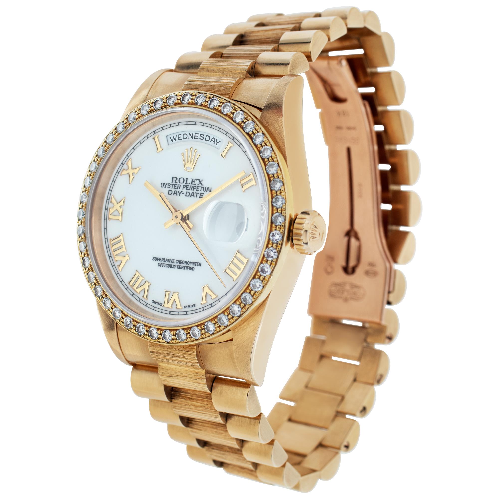 Rolex Day-Date with cutsom diamond bezel and white Roman mumeral dial on an original bark finish President bracelet. Auto w/ sweep seconds, date and day. 36 mm case size. Ref 18248. Circa 1995. **Bank wire only at this price** Fine Pre-owned Rolex