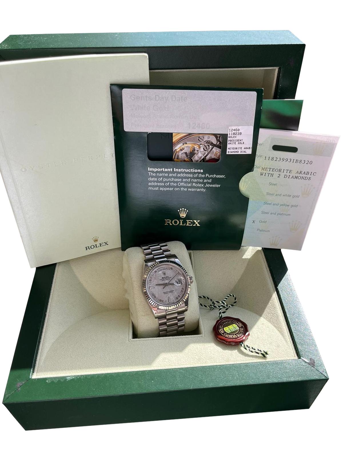 Rolex Day-Date 36mm Oyster Perpetual 118239, 18k white gold on an 18k white gold presidential bracelet, automatic Rolex caliber 3155 double quick set movement, silver meteorite dial with applied white gold and diamond hour markers at 6 and 9