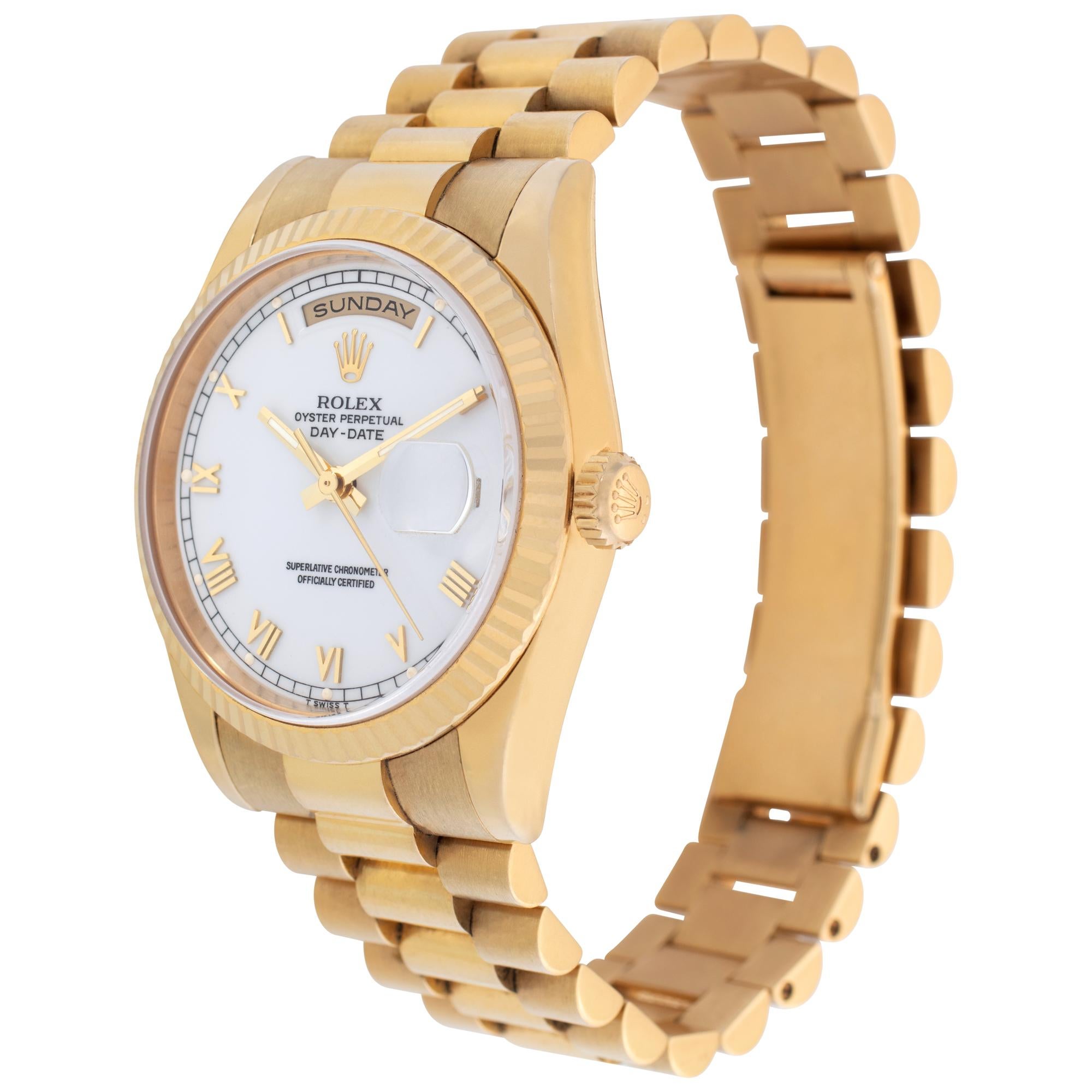 Rolex Day-Date in 18k with white dial set with yellow gold applied Roman numeral hour markers. Auto w/ sweep seconds, date and day. 36 mm case size. With box and papers. Ref 118238. Circa 2006. **Bank wire only at this price** Fine Pre-owned Rolex