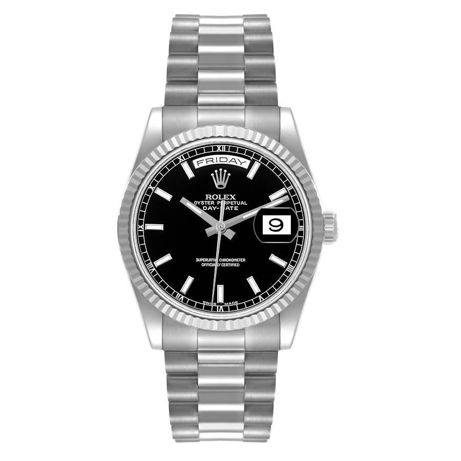 Rolex Day Date 36mm President White Gold Black Dial Mens Watch 118239 Box Card. Officially certified chronometer self-winding movement. 18k white gold oyster case 36.0 mm in diameter. Rolex logo on a crown. 18k white gold fluted bezel. Scratch