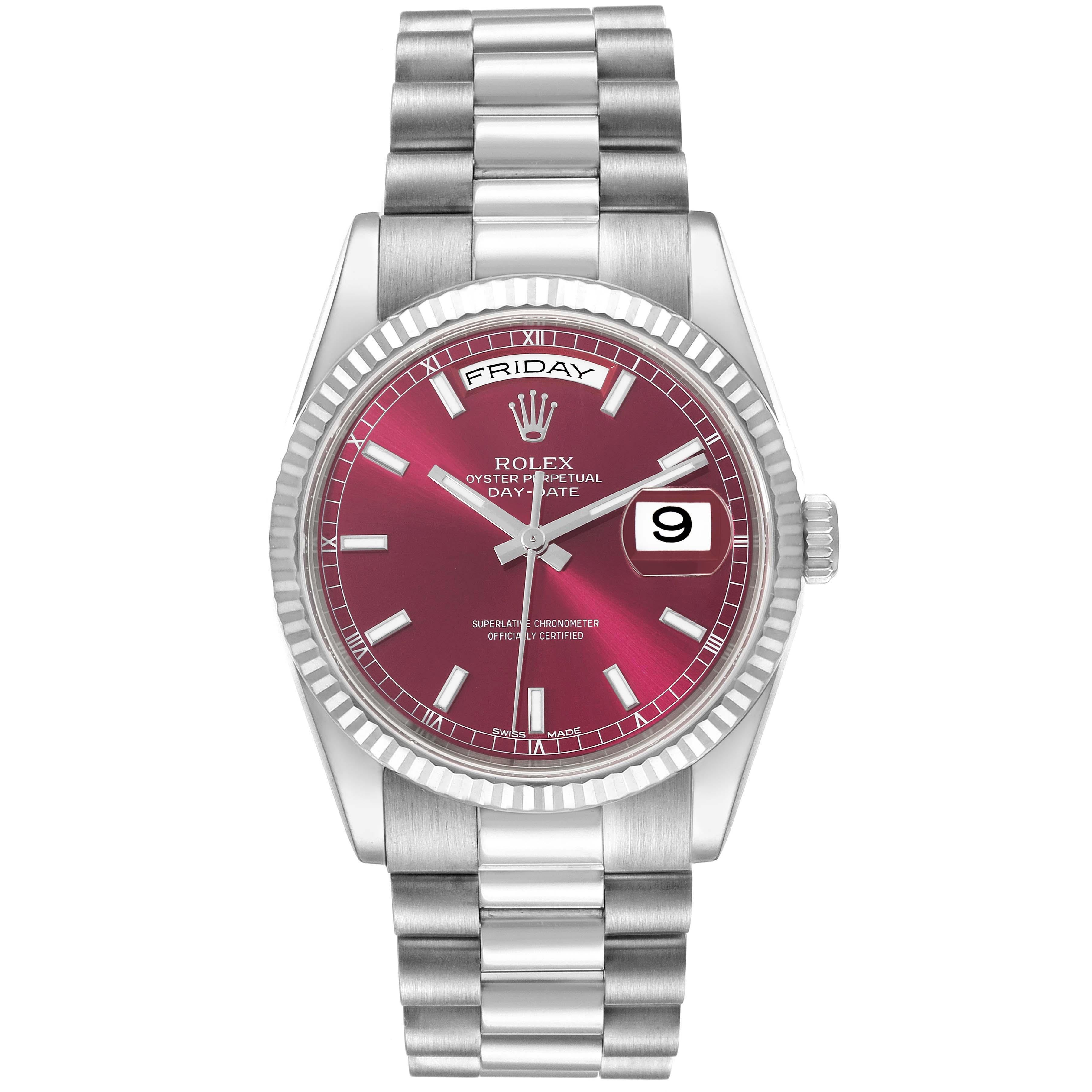 Rolex Day Date 36mm President White Gold Red Grape Dial Mens Watch 118239. Officially certified chronometer automatic self-winding movement. 18k white gold oyster case 36.0 mm in diameter. Rolex logo on the crown. 18k white gold fluted bezel.