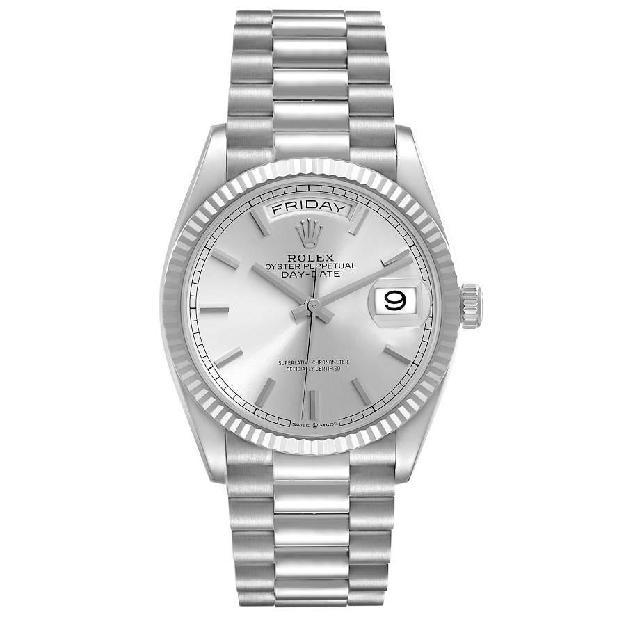 Rolex Day Date 36mm President White Gold Silver Dial Mens Watch 128239 Unworn. Officially certified chronometer self-winding movement. 18k white gold oyster case 36.0 mm in diameter. Rolex logo on a crown. 18k white gold fluted bezel. Scratch