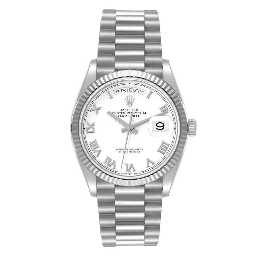 Rolex Day Date 36mm President White Gold White Dial Mens Watch 128239 Unworn. Officially certified chronometer self-winding movement. 18k white gold oyster case 36.0 mm in diameter. Rolex logo on a crown. 18k white gold fluted bezel. Scratch