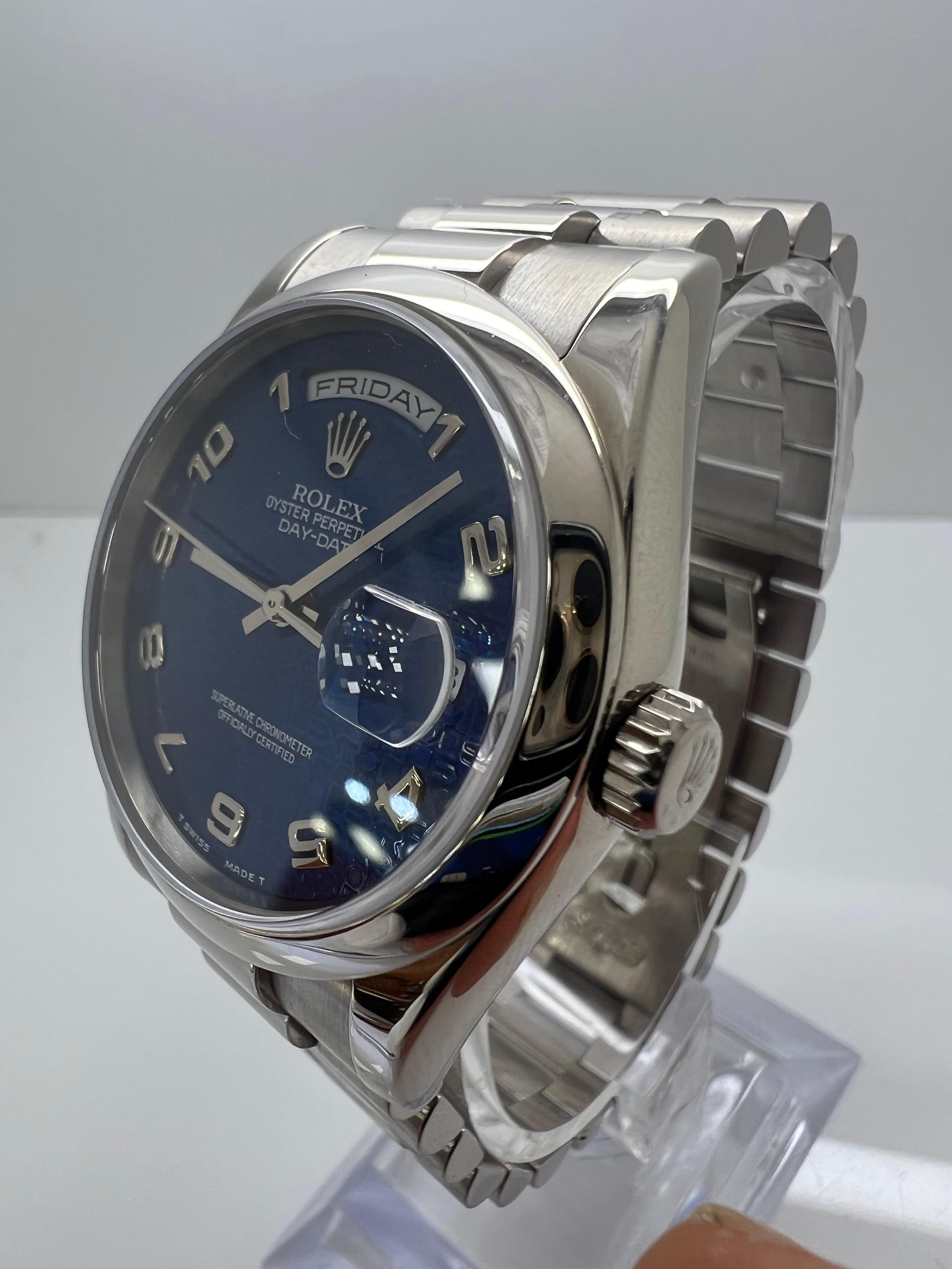 Rolex Day-Date 36mm Royal Arabic Blue Rare! 

All original Rolex Parts

excellent condition

original box papers

circa: 2003

Rare dial!!

shop with confidence

Evitadiamonds