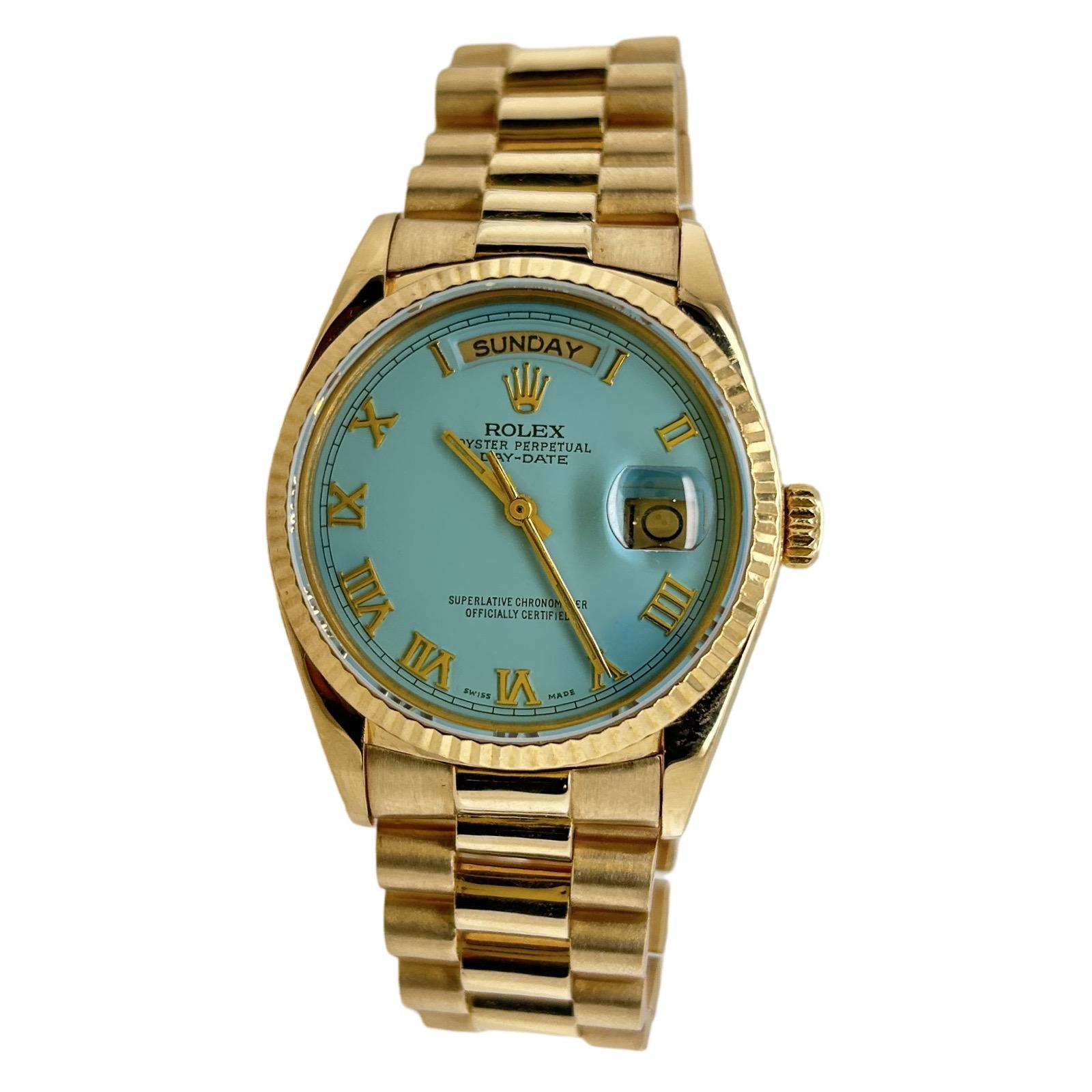 Metal: 18kt Yellow Gold
Condition: Pre-Owned
Reference Number: 18038
Year: 1988
Model: Day Date 36mm
Movement: Automatic Movement
Case Diameter/Width: 36mm
Crystal: Scratch Resistant Sapphire
Bezel: Original Bezel
Dial: AM Turquoise Dial
Clasp: