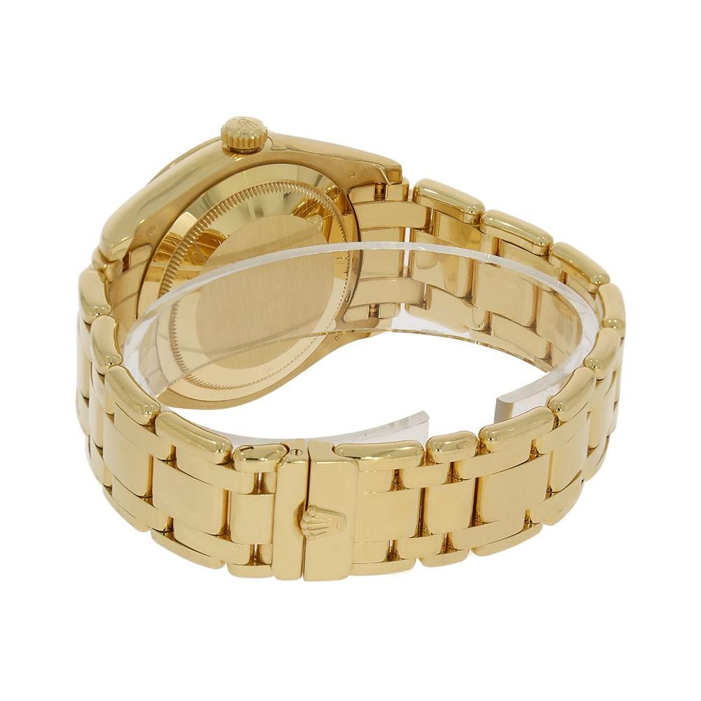 Rolex Day-Date Reference #:18948. 39mm 18K yellow gold case, screw-down back, screw-down crown with twinlock double waterproofness system, bezel set with 40 round cut diamonds, scratch-resistant sapphire crystal with cyclops lens over the date,