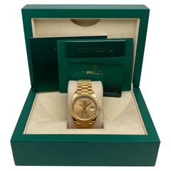 Rolex Day Date 40 228238 Oro giallo 18 carati Diamante Baguette Quadrante champagne