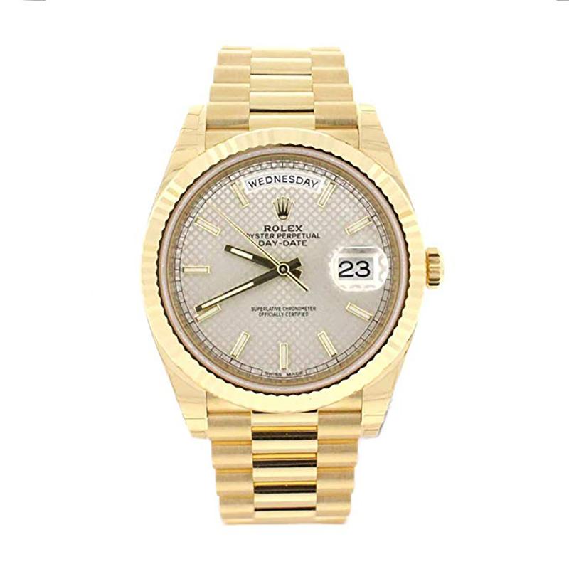 This brand new Rolex Day-Date 40 228238 sdmip is a beautiful men's timepiece that is powered by an automatic movement which is cased in a yellow gold case. It has a round shape face, day & date dial and has hand sticks style markers. It is completed