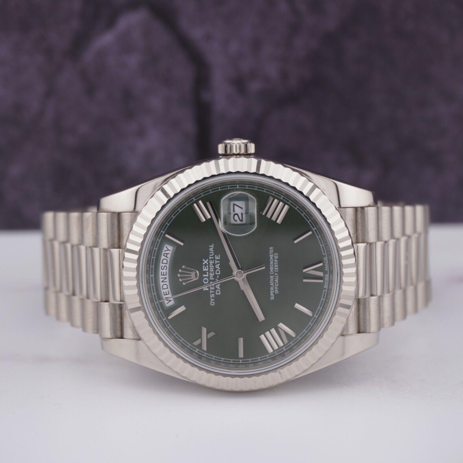 Rolex Day-Date President 40mm Watch. A Pre-owned watch w/ Original Box and 2017 Card. Watch is 100% Authentic and Comes with Authenticity Card. Watch Reference is 228239 and is in Excellent Condition (See Pictures). The dial color is Olive Green and