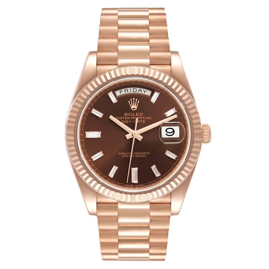 Rolex Day-Date 40 President Rose Gold Chocolate Dial Watch 228235 Box Card. Officially certified chronometer self-winding movement. 18K rose gold case 40 mm in diameter. High polished lugs. Rolex logo on a crown. 18K rose gold fluted bezel. Scratch