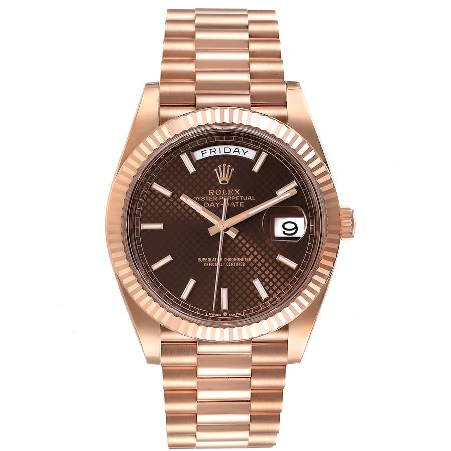 Rolex Day-Date 40 President Rose Gold Chocolate Dial Watch 228235 Unworn. Officially certified chronometer self-winding movement. 18K rose gold case 40 mm in diameter. High polished lugs. Rolex logo on a crown. 18K rose gold fluted bezel. Scratch