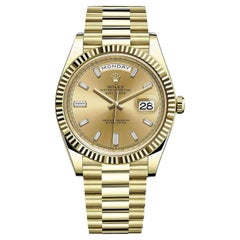 Rolex Day-Date Champagne Baguette Diamond Dial 18k Yellow Gold Watch 228238