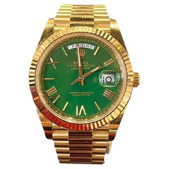 Rolex Day-Date in 18k Yellow Gold Green Roman Dial REF 228238