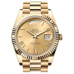 Rolex Day-Date 40mm President 18K Gold Roman Champagne Dial Watch 228238
