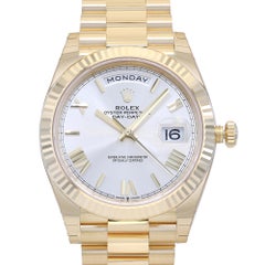 Rolex Day-Date President 18K Gold Roman Silver Dial Watch 228238