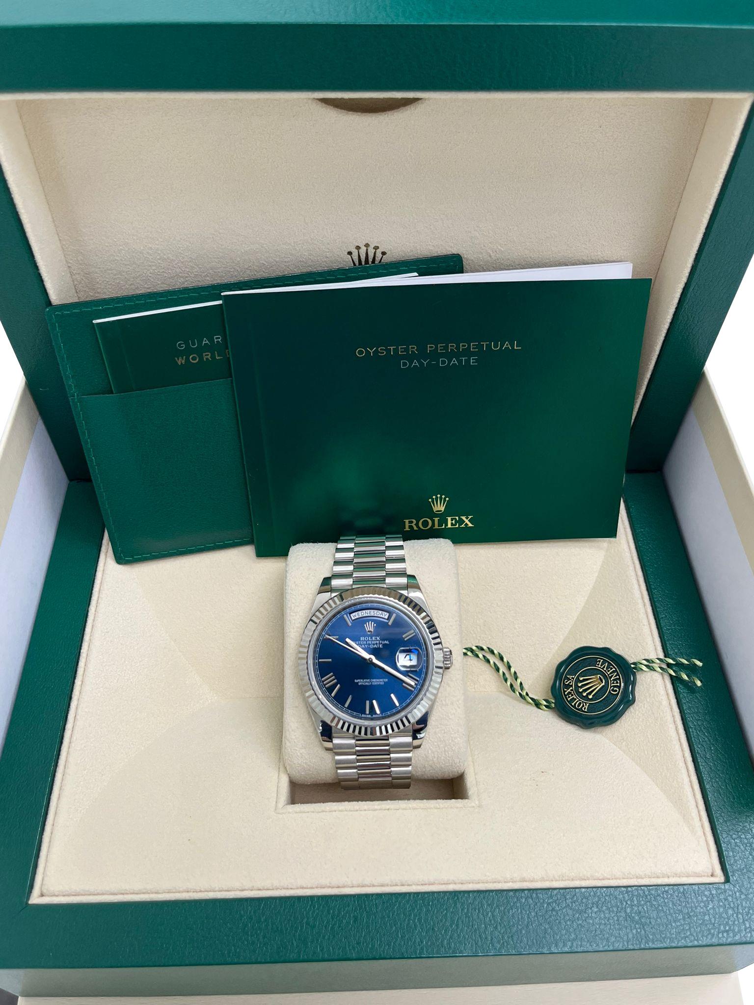 Modernist Rolex Day-Date 40mm White Gold Bright Blue Roman Dial Fluted Bezel Watch 228239 For Sale